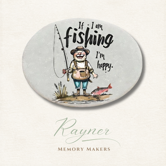 Round coaster with a fishing illustration and text 'If I am fishing I'm happy.' by Rayner Memory Makers.